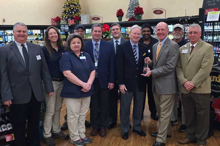 Rodney Dillard, district manager; Mara Mcvicker, beer/wine coordinator; Tina Barbee, floral manager; Russell Harp, produce manager; Cary Anselment, store manager; Dan Glei, EVP of merchandising/marketing; Ron Johnston, president and publisher, The Shelby Report; Greg Coats, assistant bakery/deli manager; Steve Smith, president and CEO; Brian Qualls, dairy manager; and Daryl Massey, district manager.