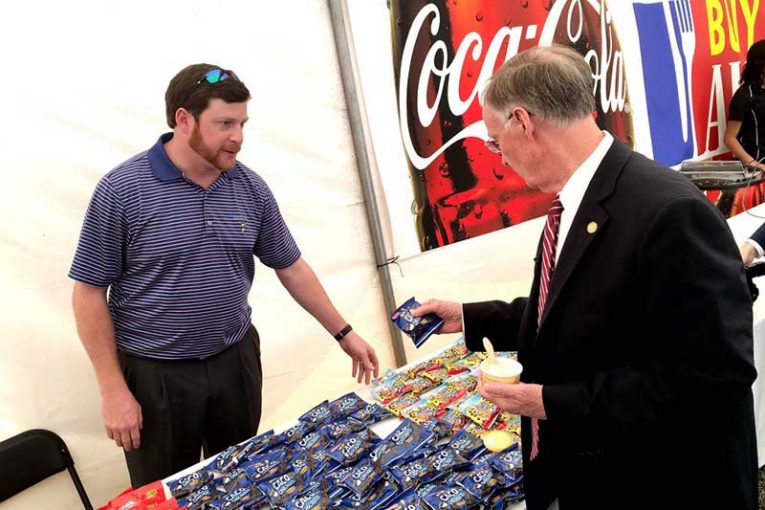 Alabama Gov. Robert Bentley samples some of Birmingham-based Bud's Best Cookies.