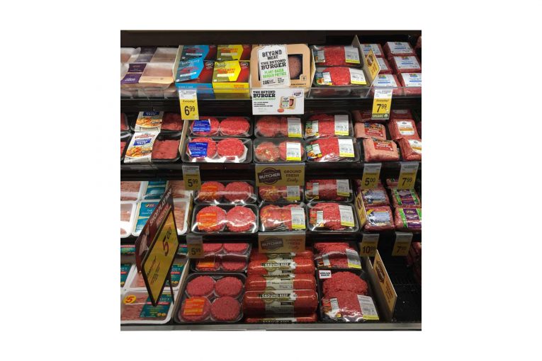 The plant-based Beyond Burger, stocked in the meat case at a Safeway store.
