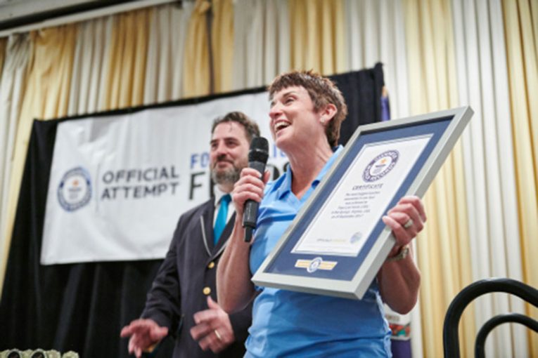 Food Lion President Meg Ham holds the official Guinness award