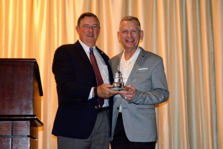 Larkin and Eskew with the Great American Award.