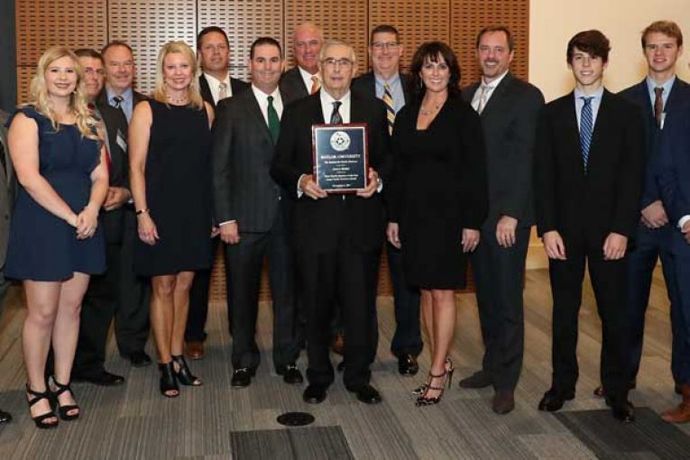 Dr. Terry Maness, Dean, Baylor School of Business; Tatum Lowe, Alan Buxkemper, Tim Cotton, Julie Lowe, Shawn Pickrell, VP and CEO Roger Lowe Jr., Randy Arceneaux, President Roger Lowe Sr., Joel Griffith, VP and General Counsel Lezlie Lowe, David Atkison, Keaton Harlan, Reece Atkinson and Cade Tumlinson.