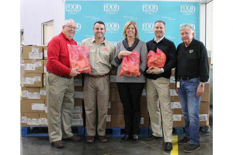 Bill Hendrix, resource development officer, Regional Food Bank; Brad Lynch, customer development manager, Tyson; Katie Fitzgerald, CEO, Regional Food Bank; Brett Lopp, Acosta Sales & Marketing; and Jack Miller, resource development officer, Regional Food Bank.