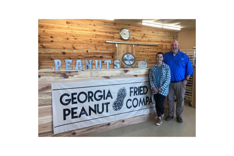 John West and his daughter, Taylor. She runs Georgia Fried Peanut Co. along with three other employees.