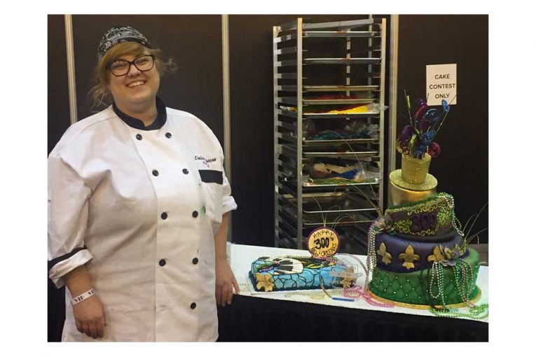 Pastry Chef Lindsay Anderson with her New Orleans themed cakes. (Photo: Twitter/ @LundsandByerlys)
