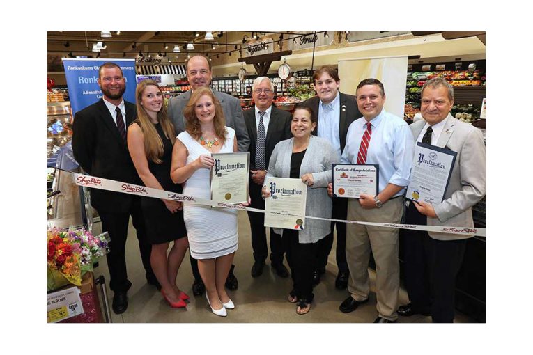 Local leaders join the Gallagher family for a ribbon-cutting ceremony Aug. 3 at the new ShopRite of Lake Ronkonkoma.