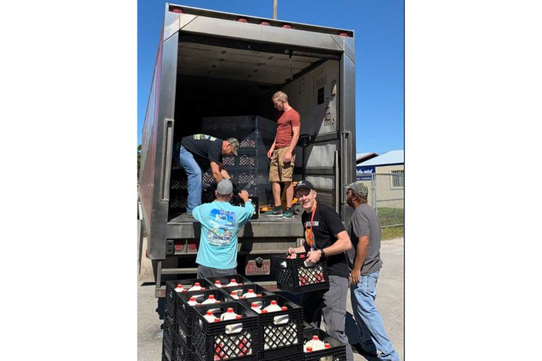 Borden drinks being unloaded off a truck.