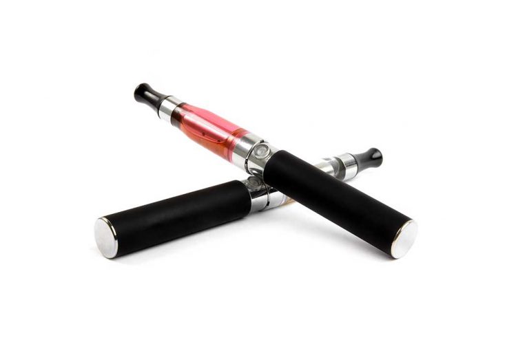 Two e-cigarettes stacked.
