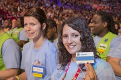 Walmart associates in the audience at the shareholders meeting received their new name badges. Each says at the bottom, “Our People Make the Difference”; above is the associate’s name and years of service.