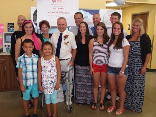 Jim Tadych with family and friends during the surprise announcement Aug. 13 that he is the 2015 Wisconsin Grocer of the Year.