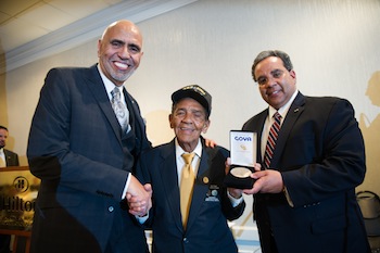 Goya Foods recently paid tribute to the 65th Infantry Regiment, the Borinqueneers, a Puerto Rican regiment that served the U.S. during World War I, World War II and the Korean War. Goya director Rafael Toro and company attorney Carlos Ortiz presented Delfin Diaz Mandez, a 94-year-old Borinqueneer, with a replica of the Congressional Gold Medal of Honor at the Capitol in Washington, D.C.