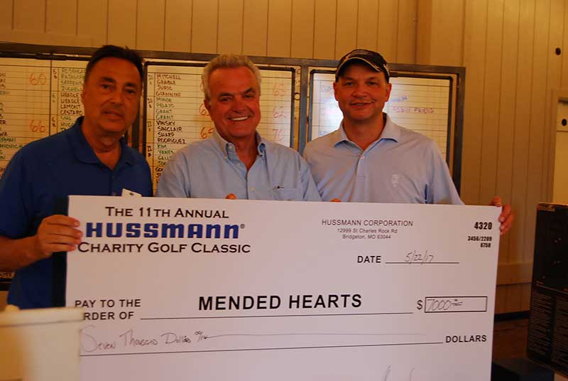 Michael Nobile, western sales director, Hussmann; Joe Pierantoni, Mended Hearts Chapter 216; and Tim Figge, CEO, Hussmann.