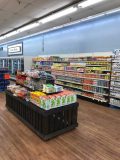 Wood-look product displays and new flooring are part of the Piggly Wiggly Country Fresh remodel.