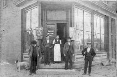 This series of photos includes an 1899 picture of the store; a 2008 photo of Erma and John Alberhasky flanked on the left by their great-grandson, JD, and grandson, Doug, and sons, William and Jerry on the right; and a 2017 photo with “Lightning,” JD, Doug, GM Develin Matthews, William, and Doug’s daughter, Jessica. Doug Alberhasky said the company’s motto is, “The more things change, the more they stay the same.”